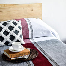 Load image into Gallery viewer, Burgundy Mod Cotton Bed Blanket on bed with pillows, book, and coffee mug
