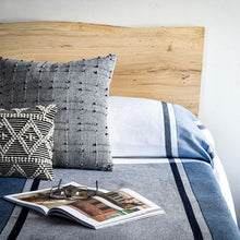 Load image into Gallery viewer, Blue Mod Cotton Bed Blanket on bed with pillows, magazine, and glasses

