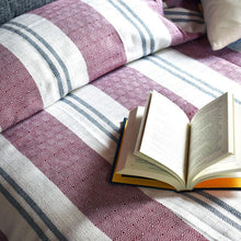 Load image into Gallery viewer, Burgundy Deco Cotton Bed Blanket on a bed with a book
