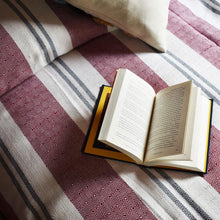 Load image into Gallery viewer, Burgundy Deco Cotton Bed Blanket on a bed with a book
